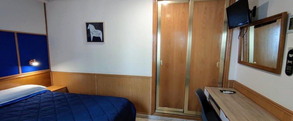 Foto de una habitación de Trípolis Toledo