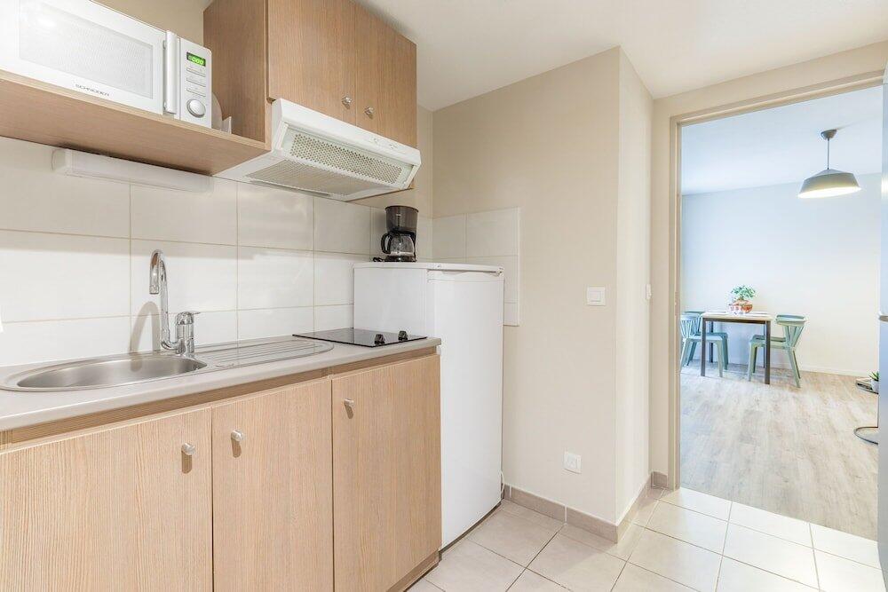 Foto de una habitación de Appart&amp;#039;City Valence Centre