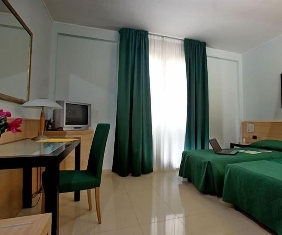 Foto de una habitación de Hotel Le Torri