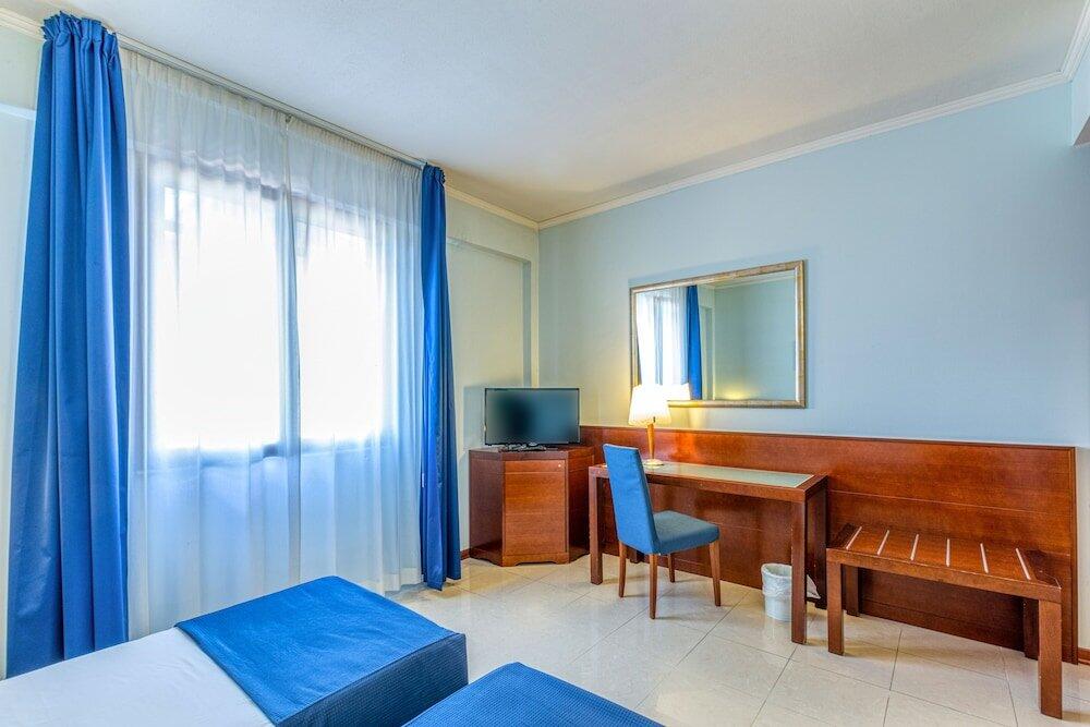 Foto de una habitación de Hotel Le Torri