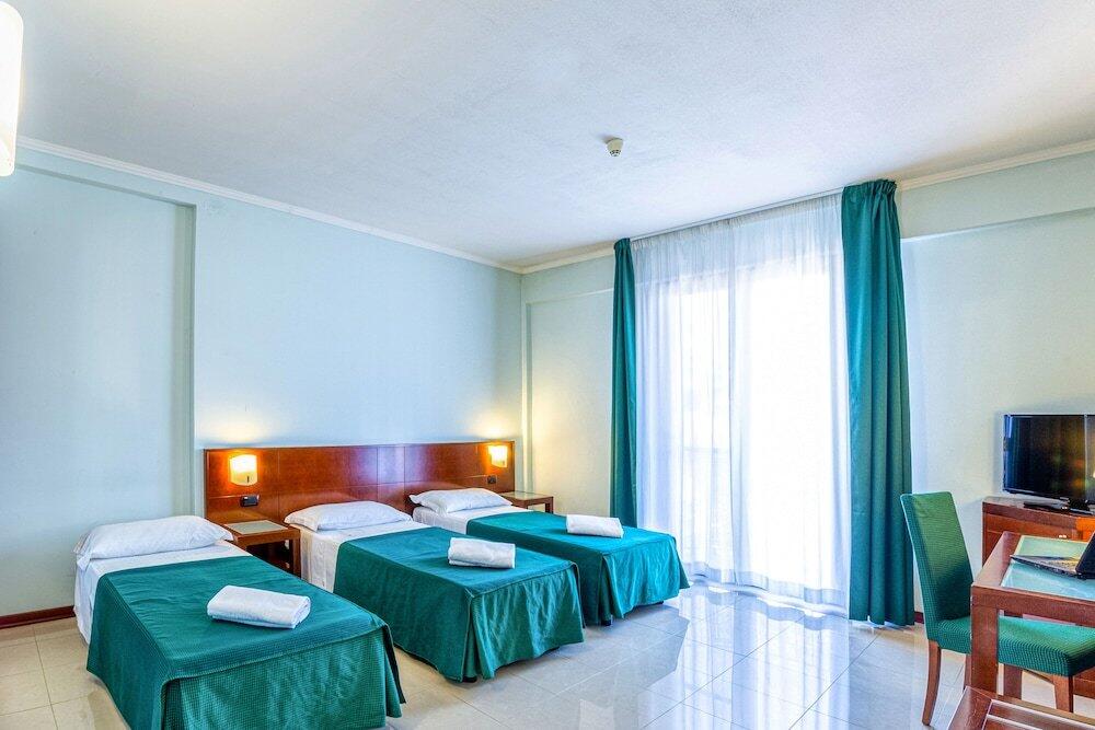 Foto de una habitación de Hotel Le Torri
