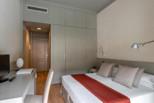 Foto de una habitación de Hotel Milano