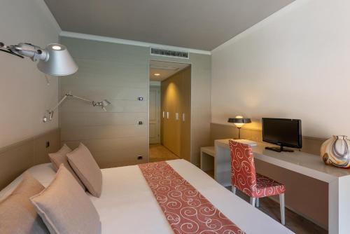 Foto de una habitación de Hotel Milano