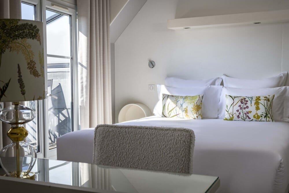 Foto de una habitación de Hôtel de Banville