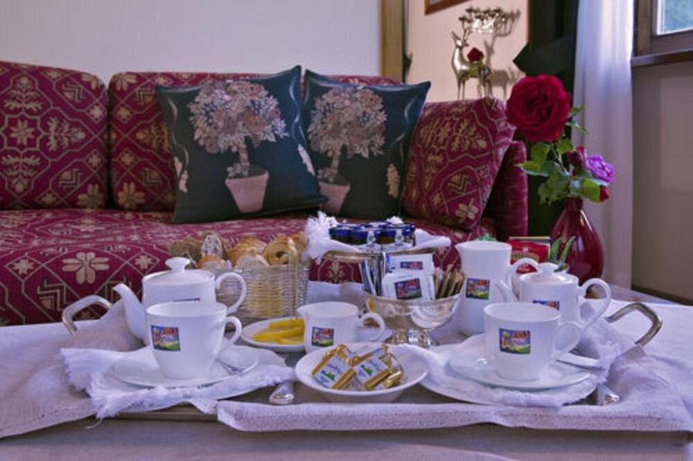 Foto de una habitación de Boutique Hotel Villa Blu Cortina D&amp;#039;Ampezzo