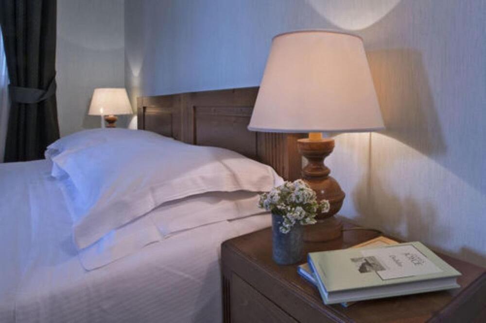 Foto de una habitación de Boutique Hotel Villa Blu Cortina D&amp;#039;Ampezzo
