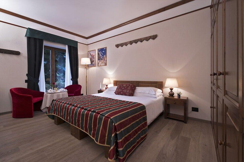 Foto de una habitación de Boutique Hotel Villa Blu Cortina D&amp;#039;Ampezzo