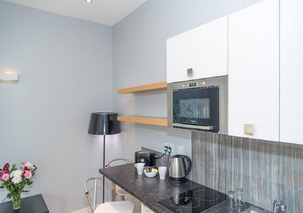 Foto de una habitación de Hyde Park Executive Apartments