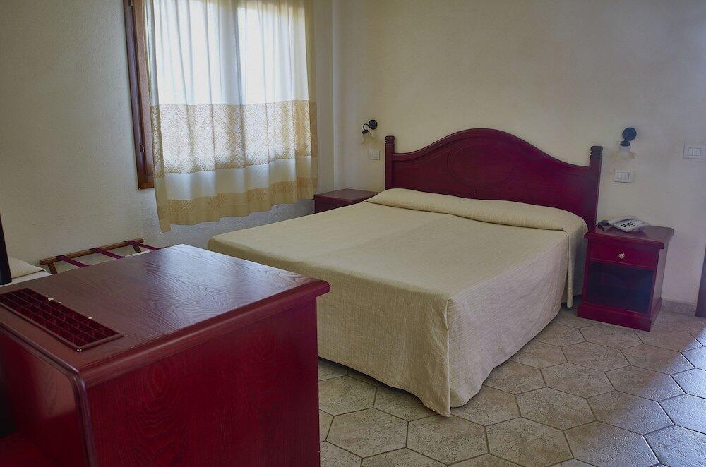 Foto de una habitación de Hotel Club Parco Blu