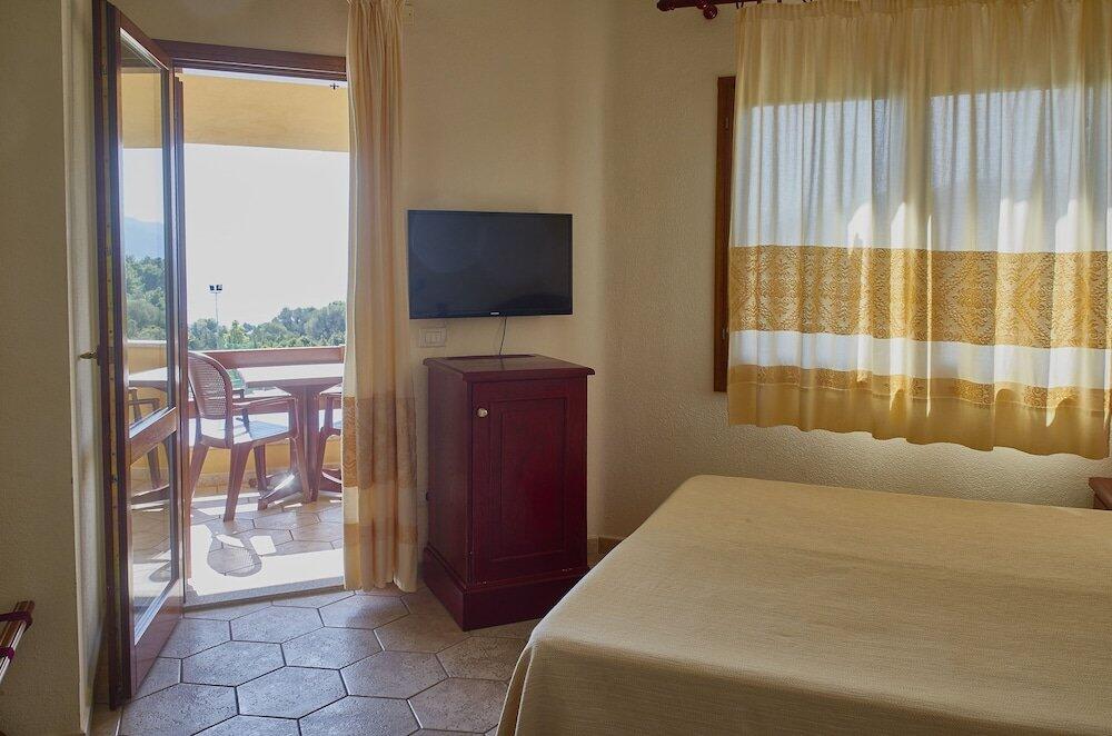 Foto de una habitación de Hotel Club Parco Blu