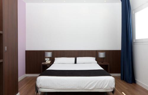 Foto de una habitación de Hotel Olympia Universidades