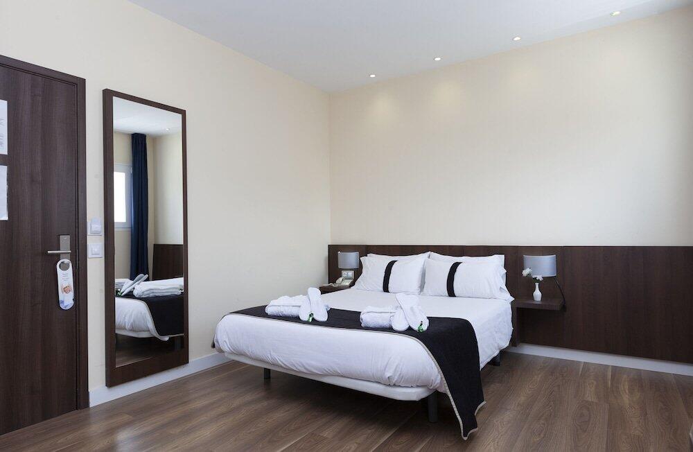 Foto de una habitación de Hotel Olympia Universidades