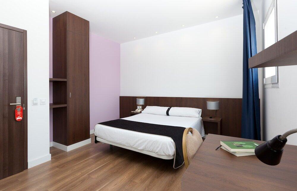 Foto de una habitación de Hotel Olympia Universidades