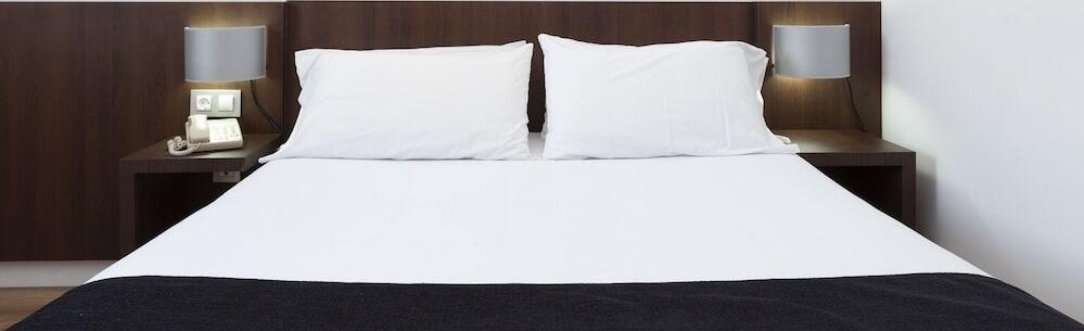 Foto de una habitación de Hotel Olympia Universidades