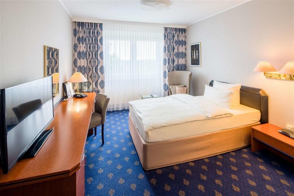 Foto de una habitación de Best Western Hotel Windorf