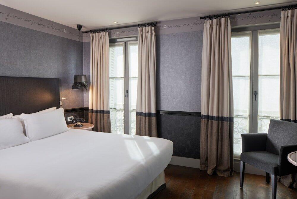 Foto de una habitación de Les Plumes Hotel