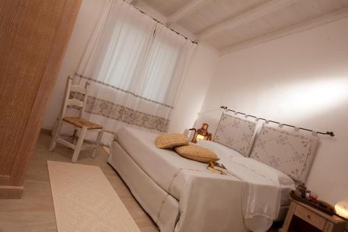 Foto de una habitación de Aparthotel Punta Falcone Resort
