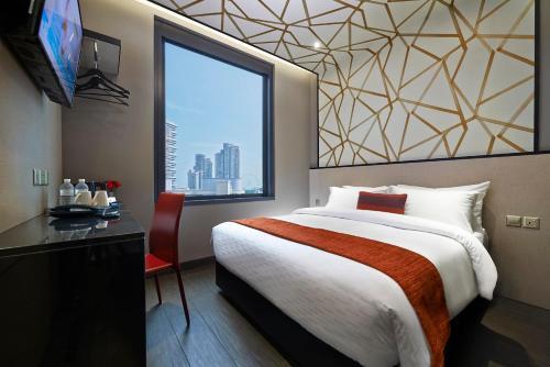 Foto de una habitación de Hotel Boss