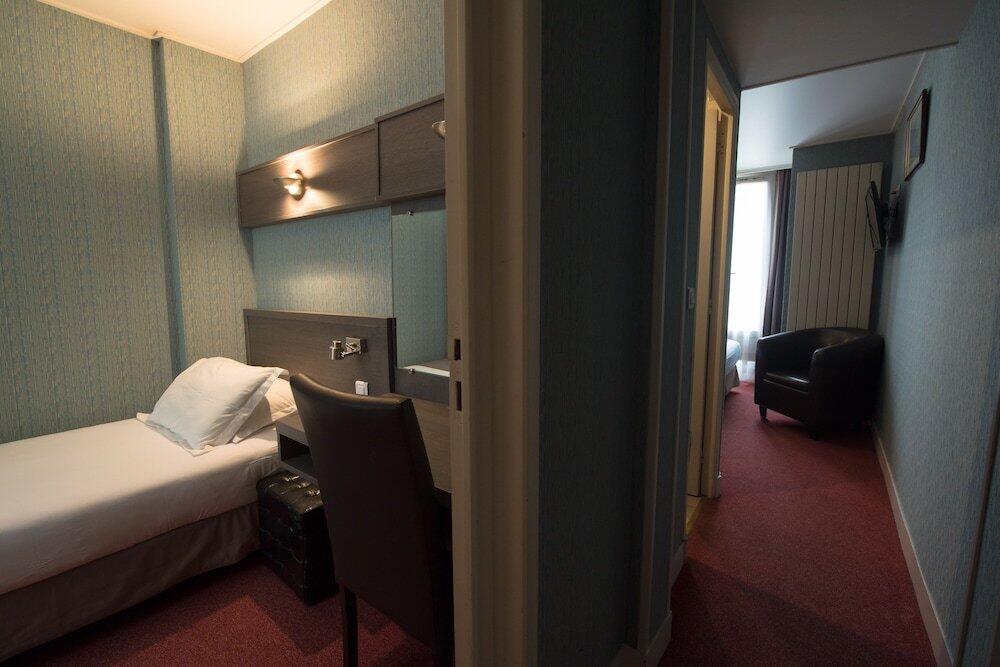 Foto de una habitación de Hotel Home Latin