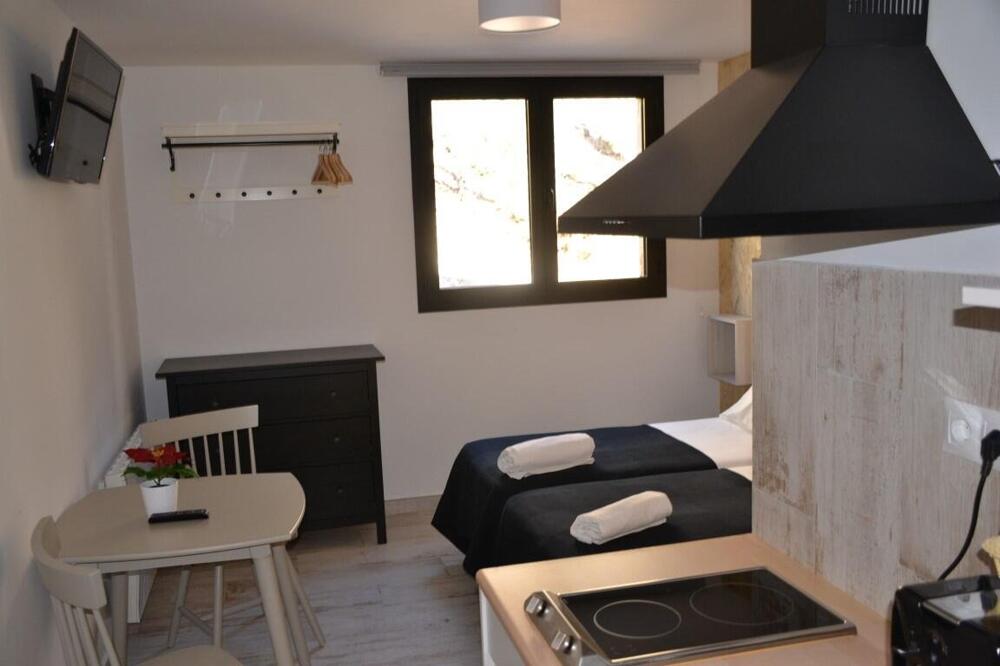 Foto de una habitación de Hotel Gorbea Suites