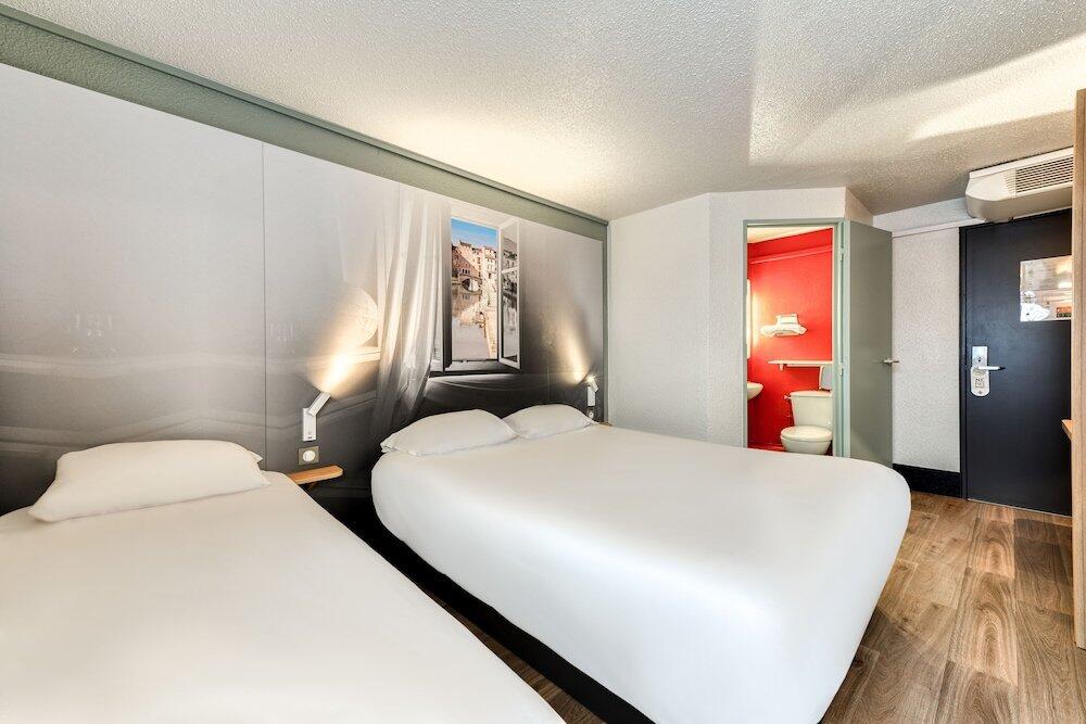 Foto de una habitación de B&amp;amp;B HOTEL Narbonne 2