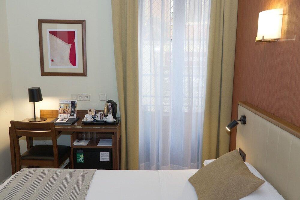 Foto de una habitación de Hospedium Hotel Los Condes