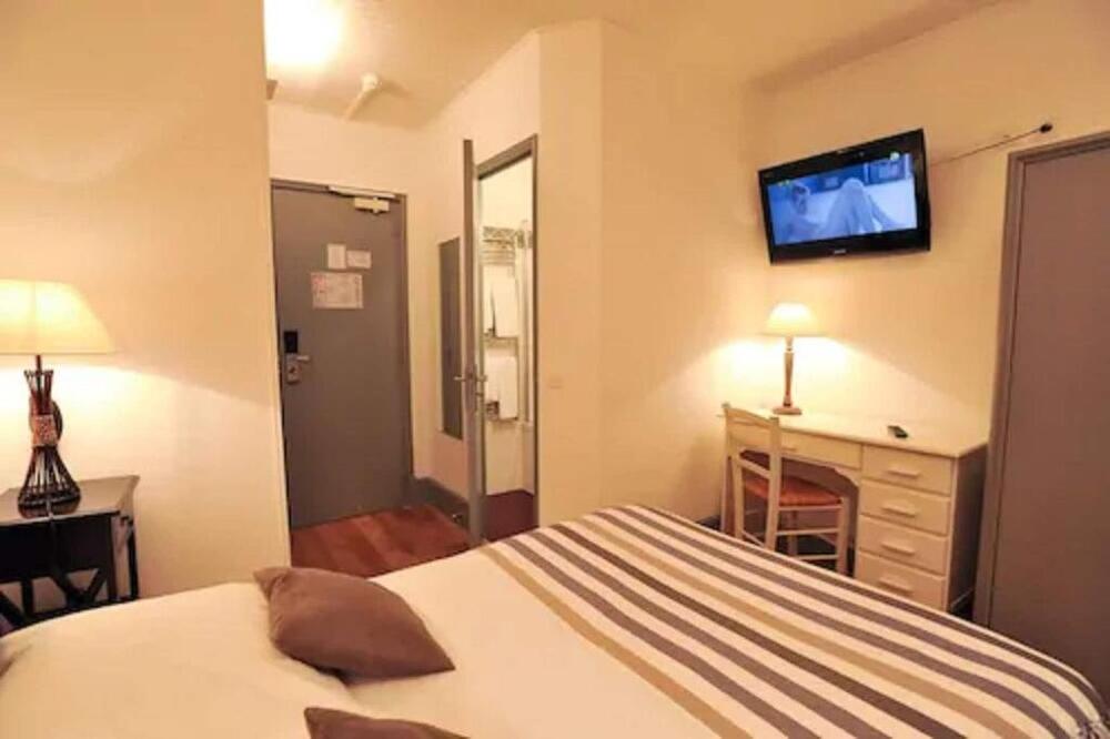 Foto de una habitación de Hôtel des Falaises