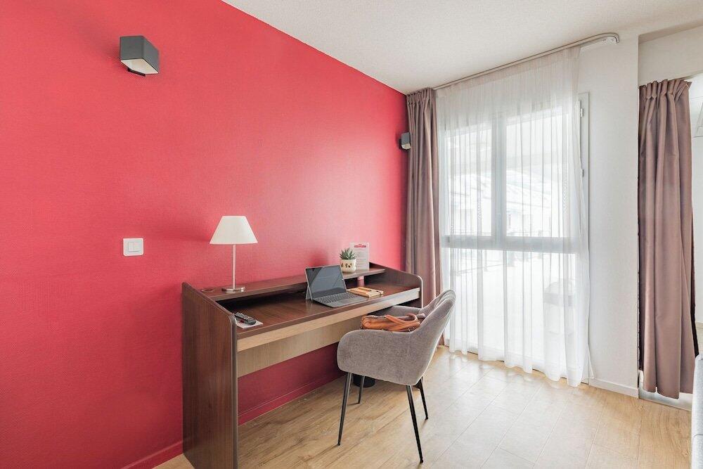 Foto de una habitación de Appart&amp;#039;City Confort Pau Centre