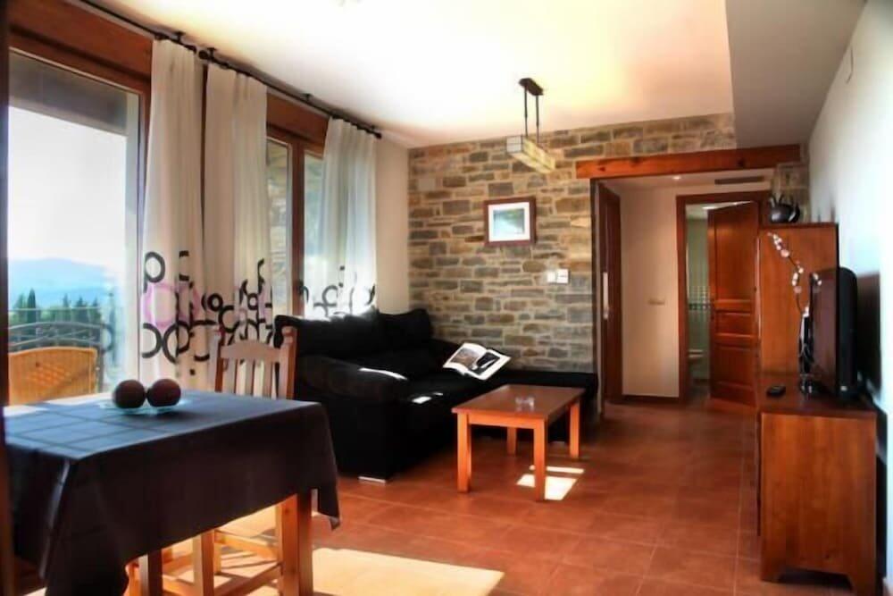 Foto de una habitación de Apartamentos Casas Pirineo, Ainsa