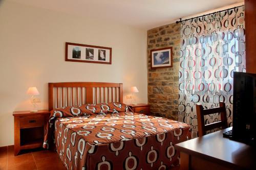 Foto de una habitación de Apartamentos Casas Pirineo, Ainsa