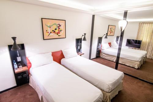 Foto de una habitación de Hotel La Residence Du Vieux Port