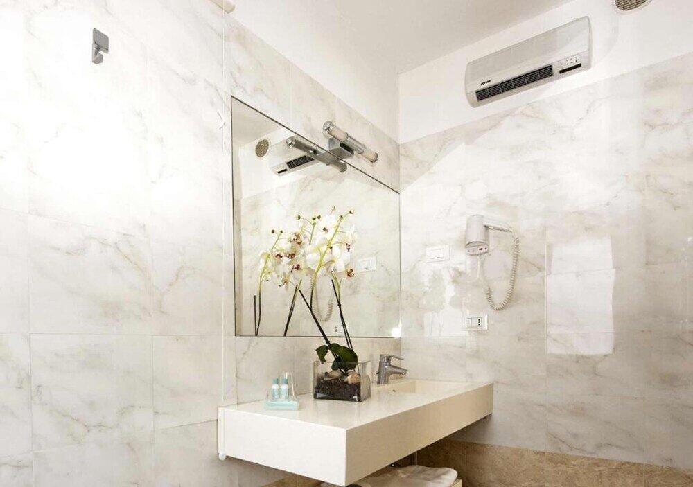 Foto del baño de Hotel Touring