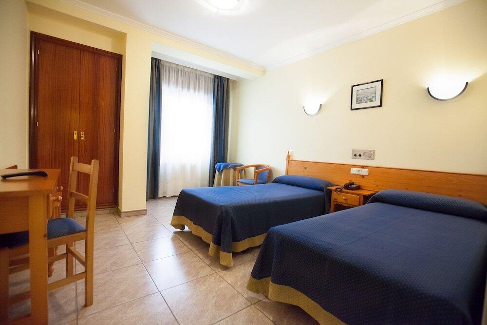 Foto de una habitación de Hotel El Puente
