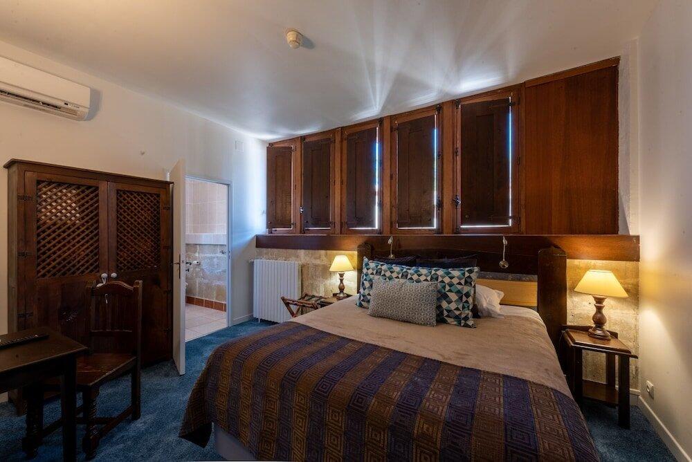 Foto de una habitación de Hotel Château Des Ducs De Joyeuse