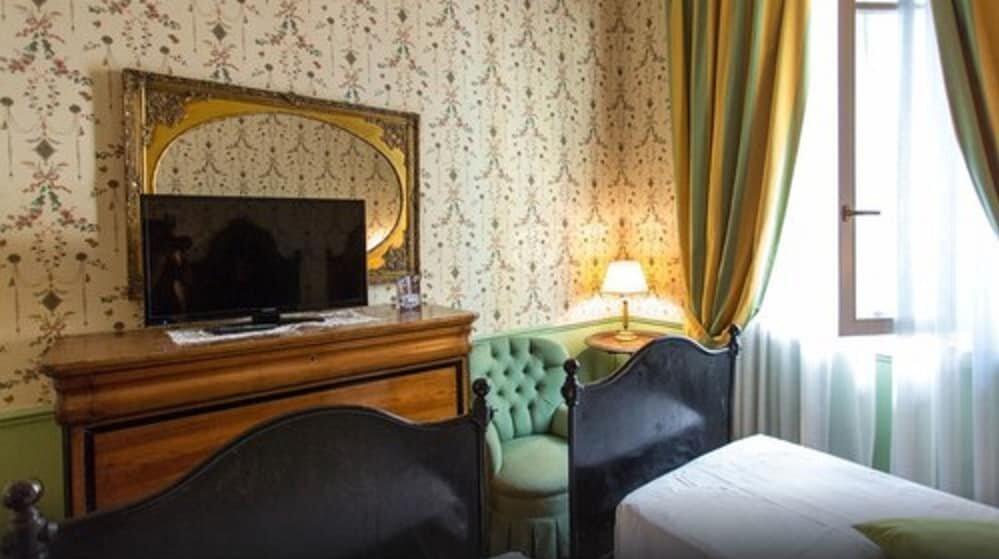 Foto de una habitación de Hotel Villa del Bosco