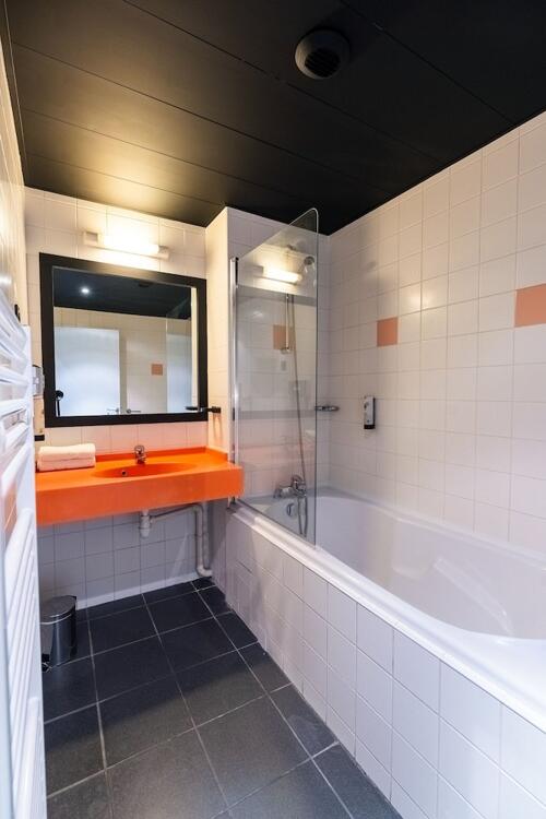 Foto del baño de Olivarius Apart Hotel Lille Villeneuve D&amp;#039;Ascq