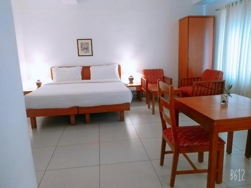 Foto de una habitación de Hotel Abad Metro