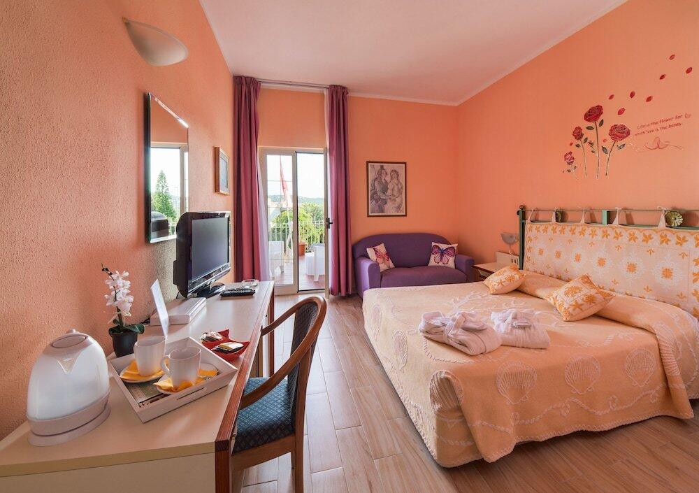 Foto de una habitación de Hotel Majore