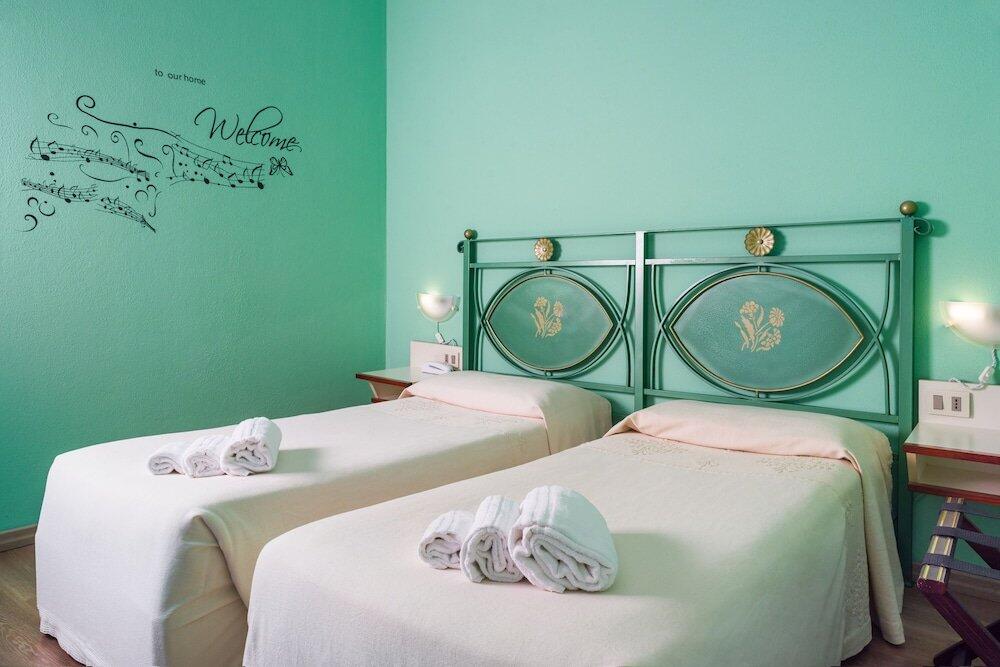 Foto de una habitación de Hotel Majore