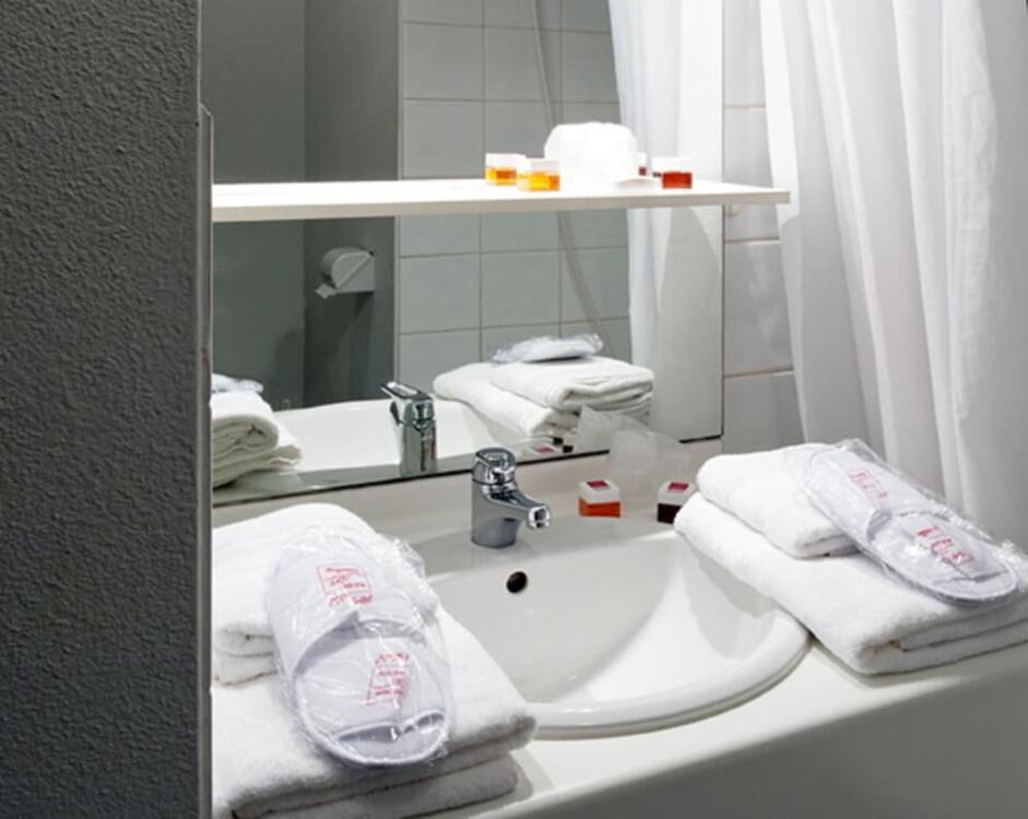 Foto del baño de Aparthotel Séjours &amp;amp; Affaires Rennes Longs Champs