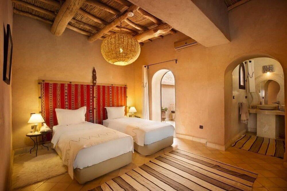 Foto de una habitación de Riad Ksar Ighnda
