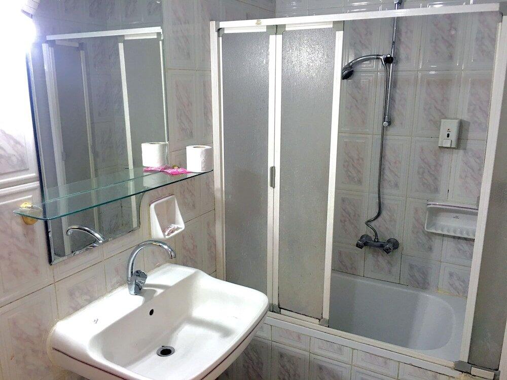 Foto de una habitación de Gaddis Hotel, Suites and Apartments