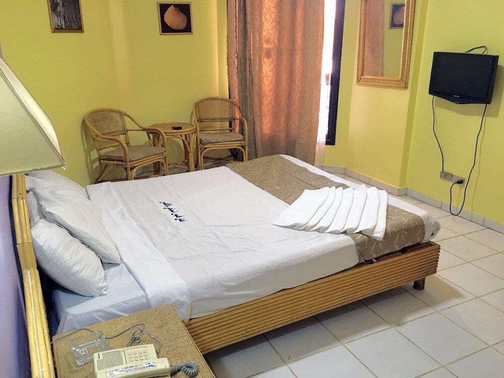 Foto de una habitación de Gaddis Hotel, Suites and Apartments