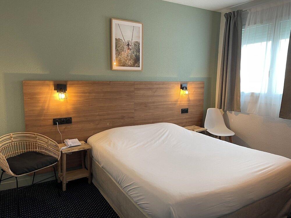 Foto de una habitación de Hotel Le Progres