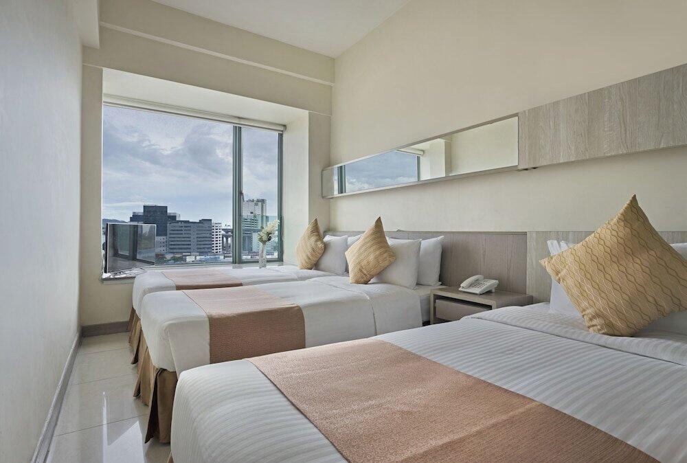 Foto de una habitación de Rambler Oasis Hotel