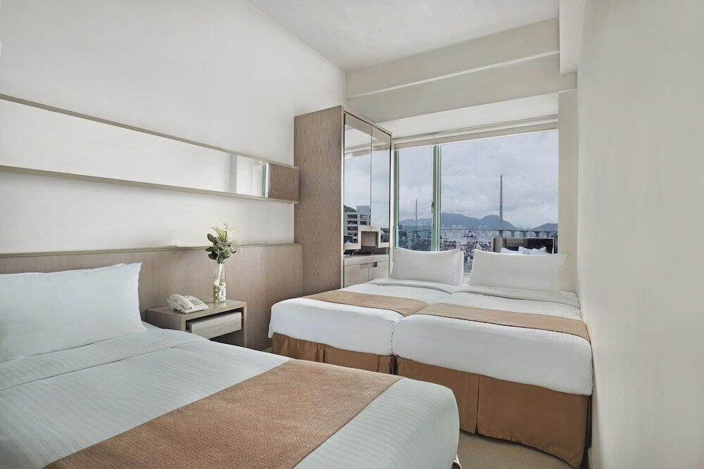 Foto de una habitación de Rambler Oasis Hotel