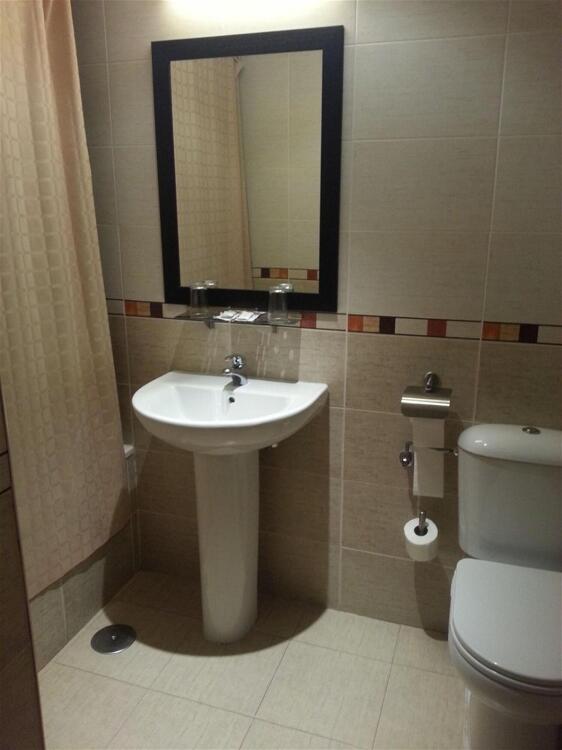 Foto del baño de Hostal El Arco