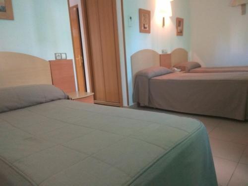 Foto de una habitación de Hostal El Arco