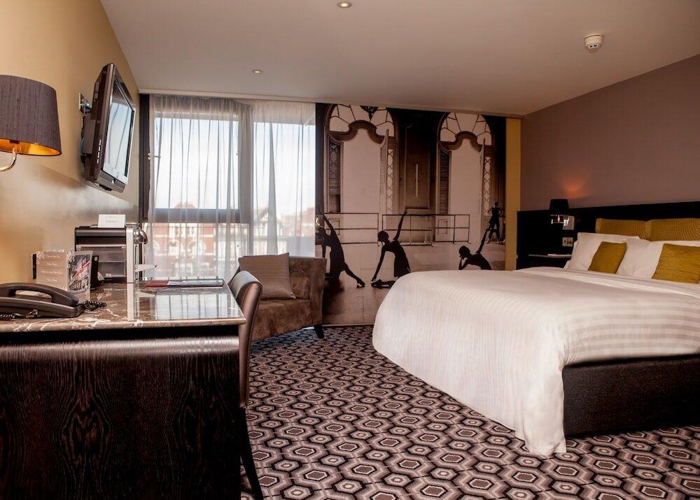 Foto de una habitación de The Vincent Hotel