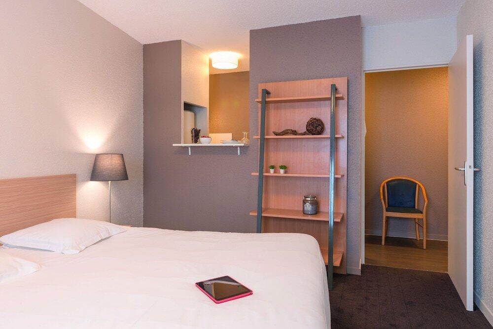 Foto de una habitación de Appart&amp;#039;City Classic Nantes Viarme